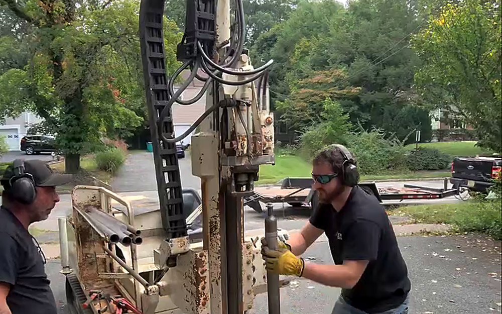A1 Tank Guys crew running a soil probe for an oil tank soil test